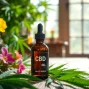 Showcase CBD Oil in a bottle with fresh hemp leaves on a wooden table.